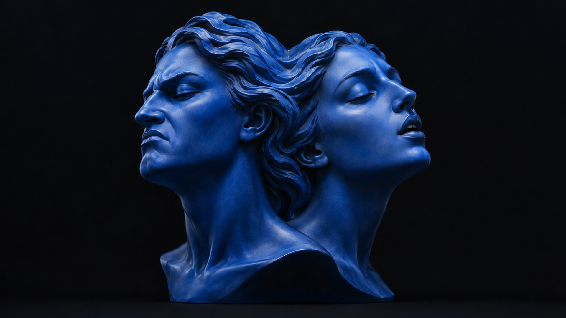 Escultura monocromática azul de dos rostros orientados en direcciones opuestas, símbolo visual de una postura contradictoria